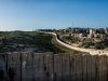 Barriera di separazione Israeliana e murales di protesta contro l'occupazione nel West Bank